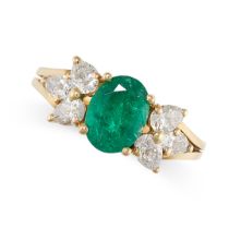 AN EMERALD AND DIAMOND RING in 18ct yellow gold, set with an oval cut emerald of 1.38 carats