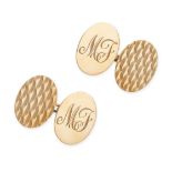 A PAIR OF VINTAGE GOLD CUFFLINKS in 9ct yellow gold, the oval faces engraved 'MF' on one side,