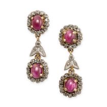 A PAIR OF RUBY AND DIAMOND DROP EARRINGS each comprising a cabochon ruby in a cluster of single