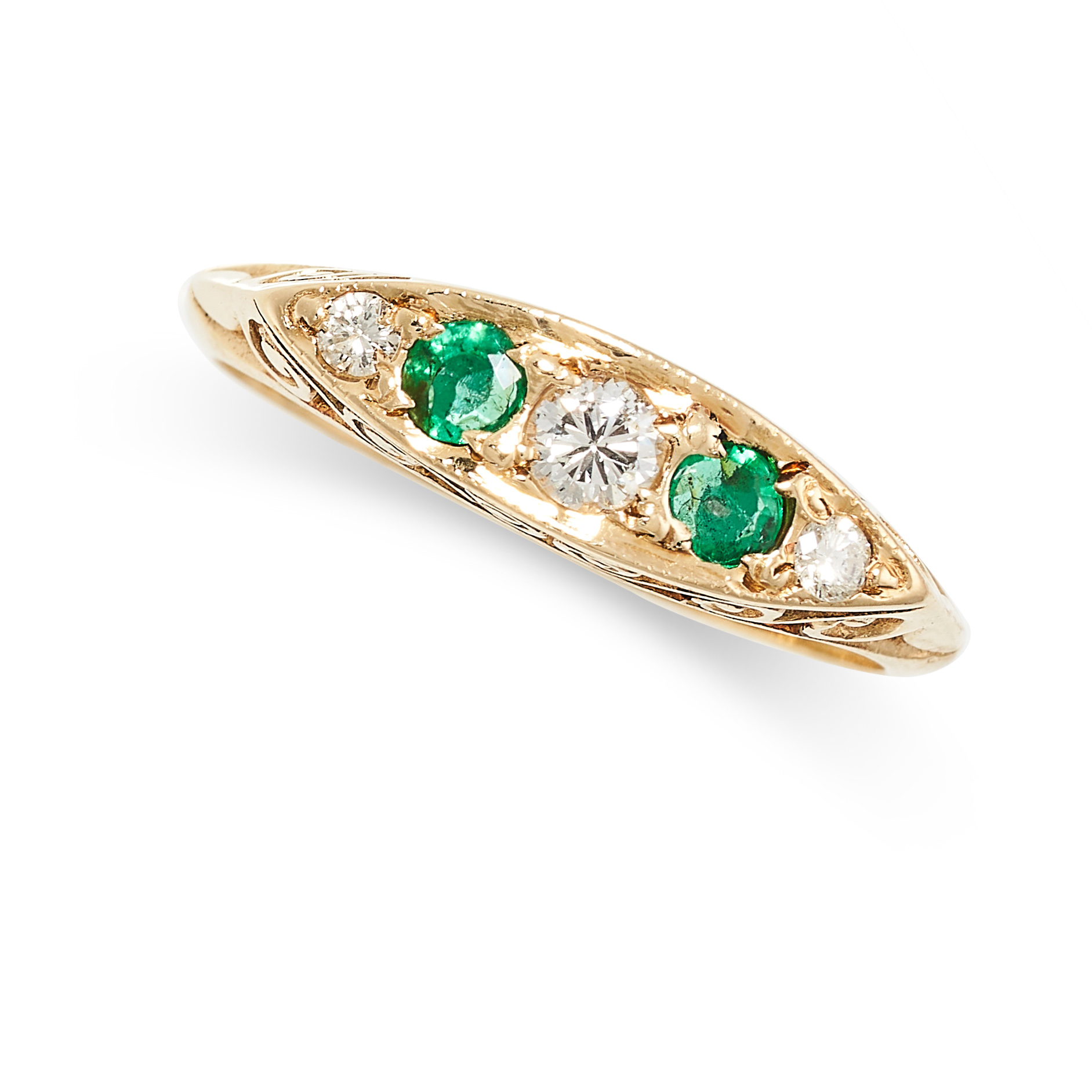 A VINTAGE EMERALD AND DIAMOND RING in 18ct yellow gold, the elliptical face set with a row of
