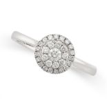 A DIAMOND CLUSTER RING set to the centre with a round brilliant cut diamond, within a double