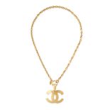 CHANEL, A VINTAGE CC PENDANT AND CHAIN the pendant designed as a quilted interlocking CC logo,