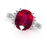 A GLASS FILLED RUBY AND DIAMOND RING in 14ct white gold, set with a cushion cut glass filled ruby,