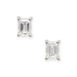 A PAIR OF DIAMOND STUD EARRINGS in 18ct white gold, each set with an emerald cut diamond, the