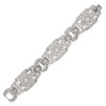 AN ART DECO DIAMOND BRACELET, CIRCA 1930 designed as three large open-work stylised panels,