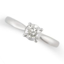 A SOLITAIRE DIAMOND RING in platinum, set with a round brilliant cut diamond of 0.74 carats, full