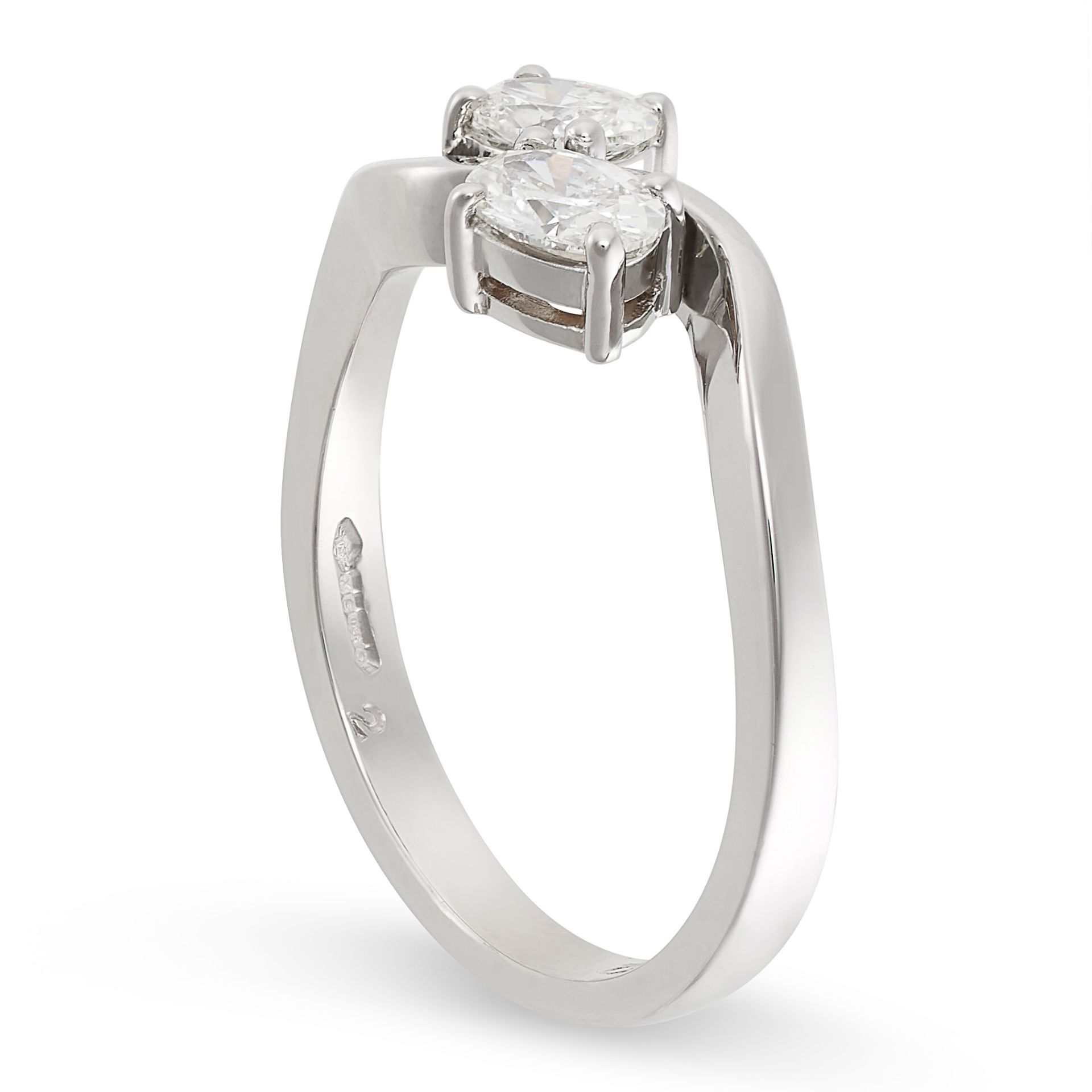 A DIAMOND TOI ET MOI RING in platinum, set with two oval cut diamonds both totalling 0.52 carats, - Bild 2 aus 2