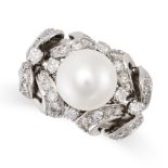 A VINTAGE PEARL AND DIAMOND RING set with a pearl of 9.3mm accented by single cut diamonds over a
