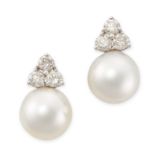 A PAIR OF SOUTHSEA PEARL AND DIAMOND EARRINGS in 18ct white gold, each set with a trio of round