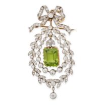 A FINE ANTIQUE BELLE EPOQUE PERIDOT AND DIAMOND BROOCH / PENDANT in platinum and yellow gold, set