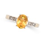 A CITRINE AND DIAMOND RING in 9ct yellow gold, set with an oval cut citrine accented by round cut