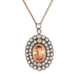 AN ANTIQUE IMPERIAL TOPAZ AND DIAMOND PENDANT AND CHAIN in yellow gold and silver, the oval