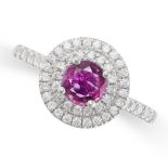 A RUBY AND DIAMOND CLUSTER RING in platinum, set to the centre with a round cut ruby of 0.60