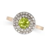 A PERIDOT AND DIAMOND RING in 9ct yellow gold, set with a round cut peridot in a cluster of round