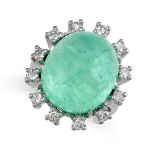 AN EMERALD AND DIAMOND RING in 18ct white gold, set with a cabochon emerald of 22.79 carats within a