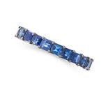 A SAPPHIRE ETERNITY RING in 18ct white gold, set all around with a row of blue step cut and French