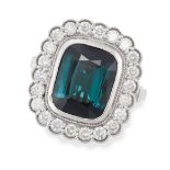 A TEAL TOURMALINE AND DIAMOND CLUSTER RING set with a cushion cut teal-green tourmaline of 5.90