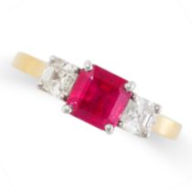 A RUBY AND DIAMOND THREE STONE RING in 18ct yellow, set with an octagonal step cut ruby of 1.77