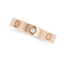 CARTIER, A DIAMOND LOVE RING in 18ct rose gold, one of the screw motifs set with a round brilliant