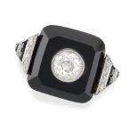 AN ART DECO ONYX AND DIAMOND RING in platinum, comprising a faceted onyx tablet set with an old