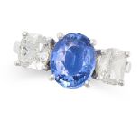 A SAPPHIRE AND DIAMOND THREE STONE RING in 18ct white gold, set with an oval cut sapphire of 2.52