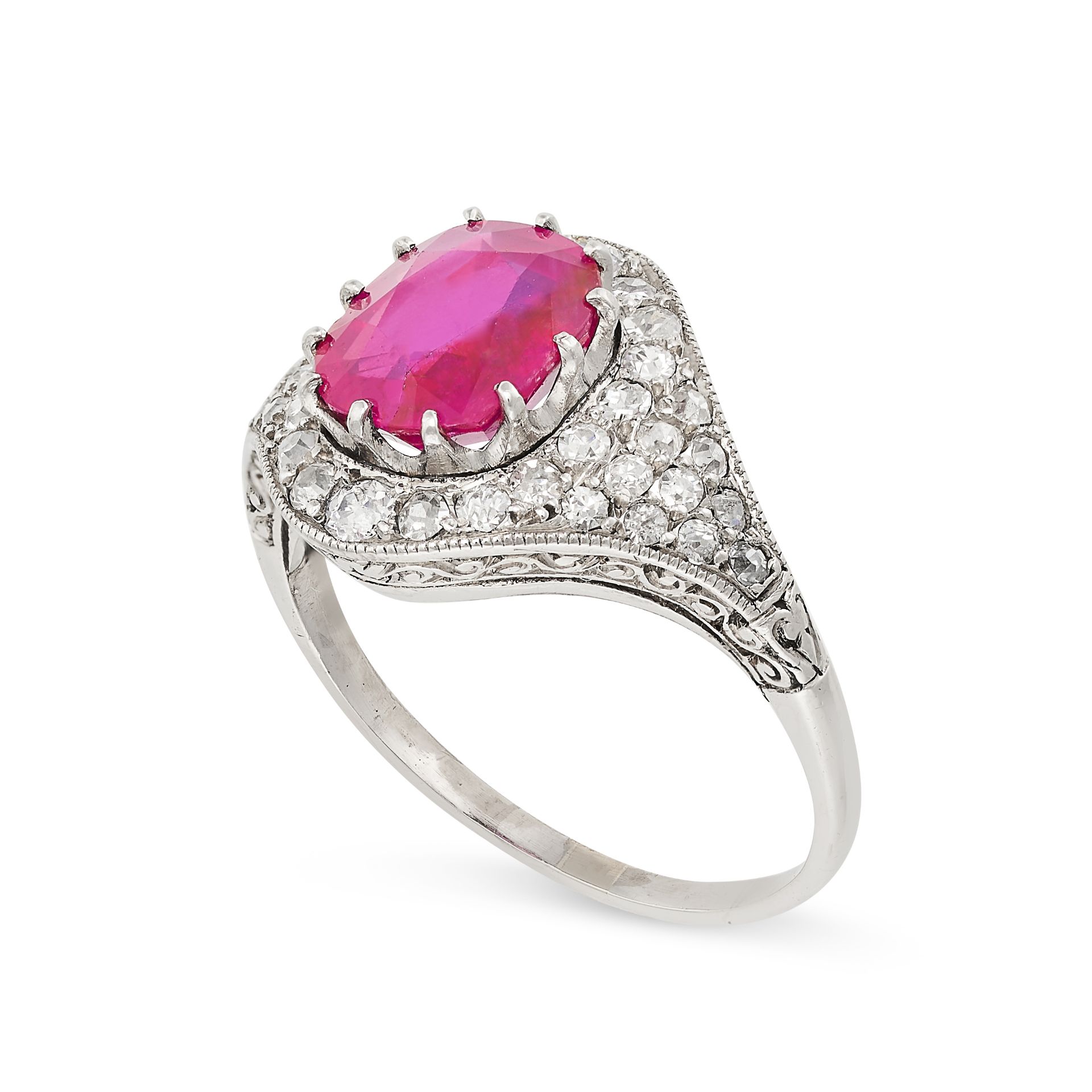 A VINTAGE BURMA NO HEAT RUBY AND DIAMOND RING in white gold, set with a cushion cut ruby of 3.48 - Bild 2 aus 2