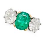 A FINE COLOMBIAN EMERALD AND DIAMOND THREE STONE RING in 18ct white and yellow gold, set with an