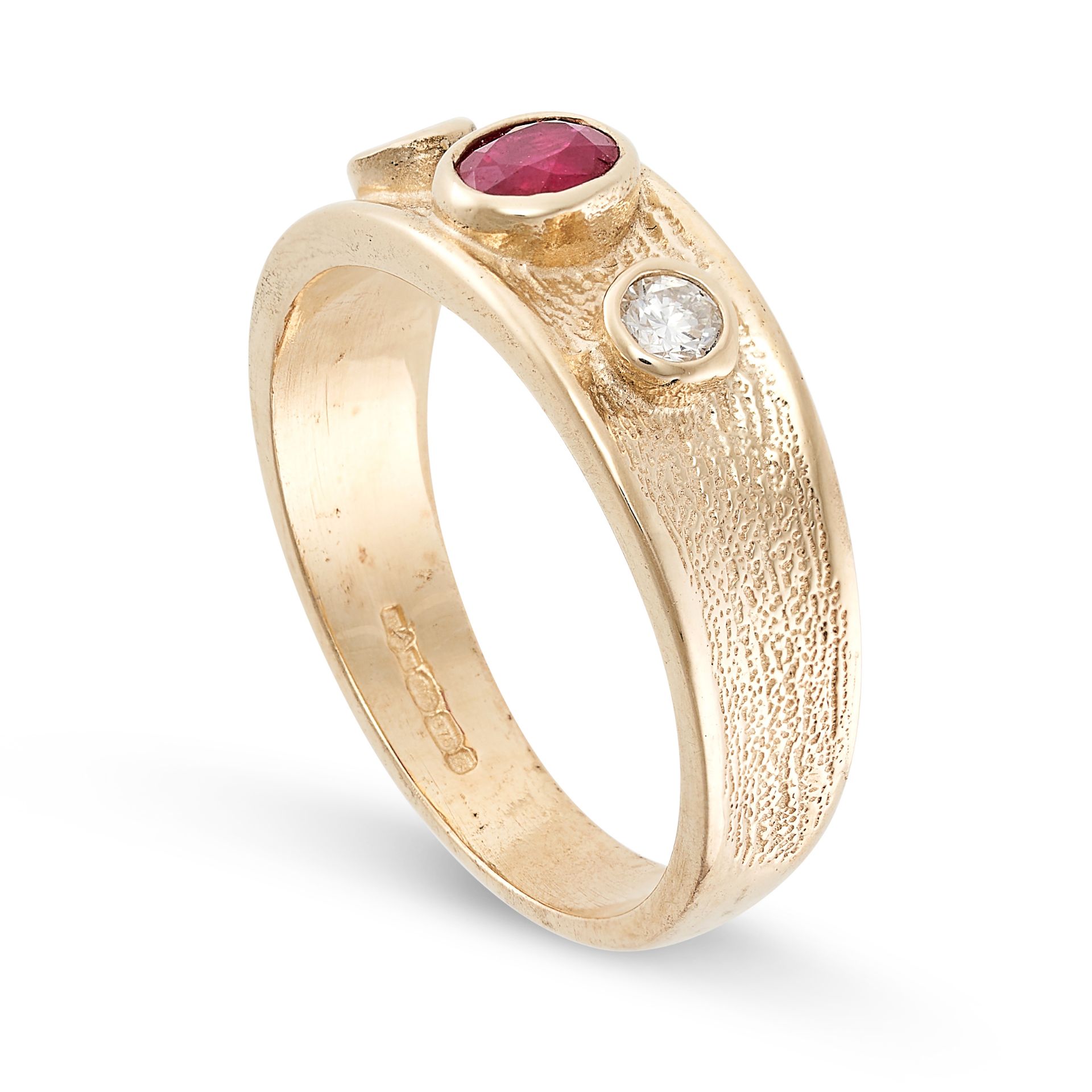 A RUBY AND DIAMOND BAND RING in 9ct yellow gold, set with an oval cut ruby between two round cut - Bild 2 aus 2