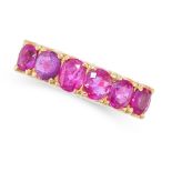 A RUBY SIX STONE RING in yellow gold, set with six oval cut rubies all totalling 1.5-1.6 carats,