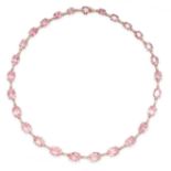 A PINK TOURMALINE AND DIAMOND NECKLACE in 18ct rose gold, set with a graduated row of oval cut