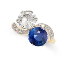 A SAPPHIRE AND DIAMOND TOI ET MOI RING in 18ct yellow and white gold, set with a round cut
