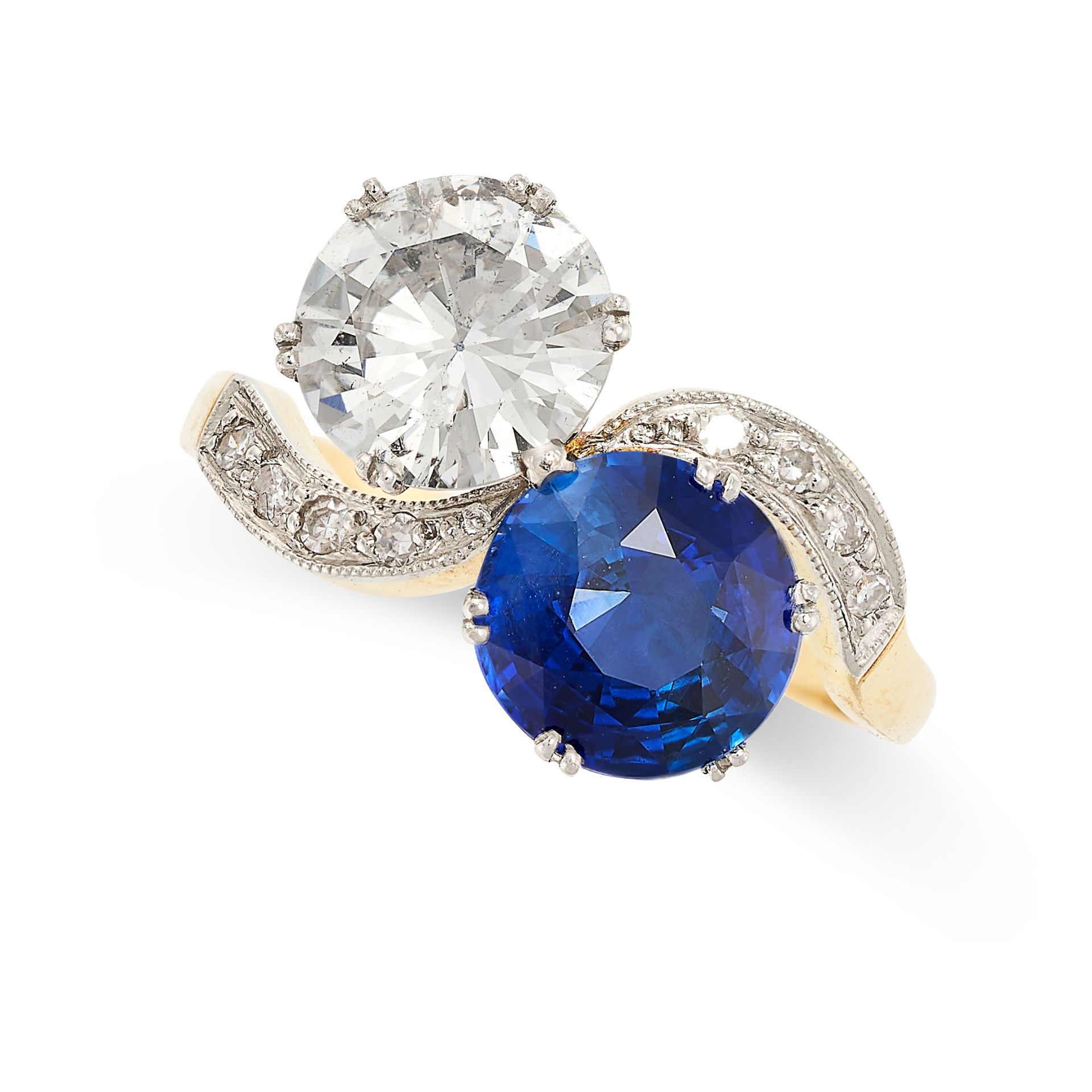 A SAPPHIRE AND DIAMOND TOI ET MOI RING in 18ct yellow and white gold, set with a round cut