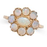 AN OPAL RING in 9ct yellow gold, set with a cluster of cabochon opals, full British hallmarks,