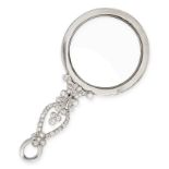 AN ART DECO DIAMOND EYE GLASS / LORGNETTE the circular lens within a border of old cut diamonds,