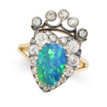 A FINE OPAL AND DIAMOND SWEETHEART RING in yellow gold and silver, designed to depict a heart