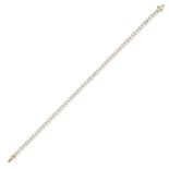 A DIAMOND LINE BRACELET in 18ct yellow gold, set with a row of sixty round brilliant cut diamonds