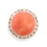 A VINTAGE CORAL AND DIAMOND CLUSTER RING in yellow gold, the ring set with a central cabochon