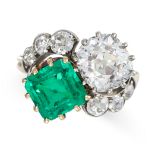 A FINE EDWARDIAN COLOMBIAN EMERALD AND DIAMOND TOI ET MOI RING in 18ct yellow gold, set with an