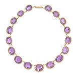 AN ANTIQUE AMETHYST RIVIERE NECKLACE, 19TH CENTURY in yellow gold, set with a row of graduated