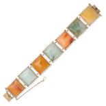 A JADEITE JADE PANEL BRACELET in 18ct yellow gold, set with a row of varicoloured green and honey