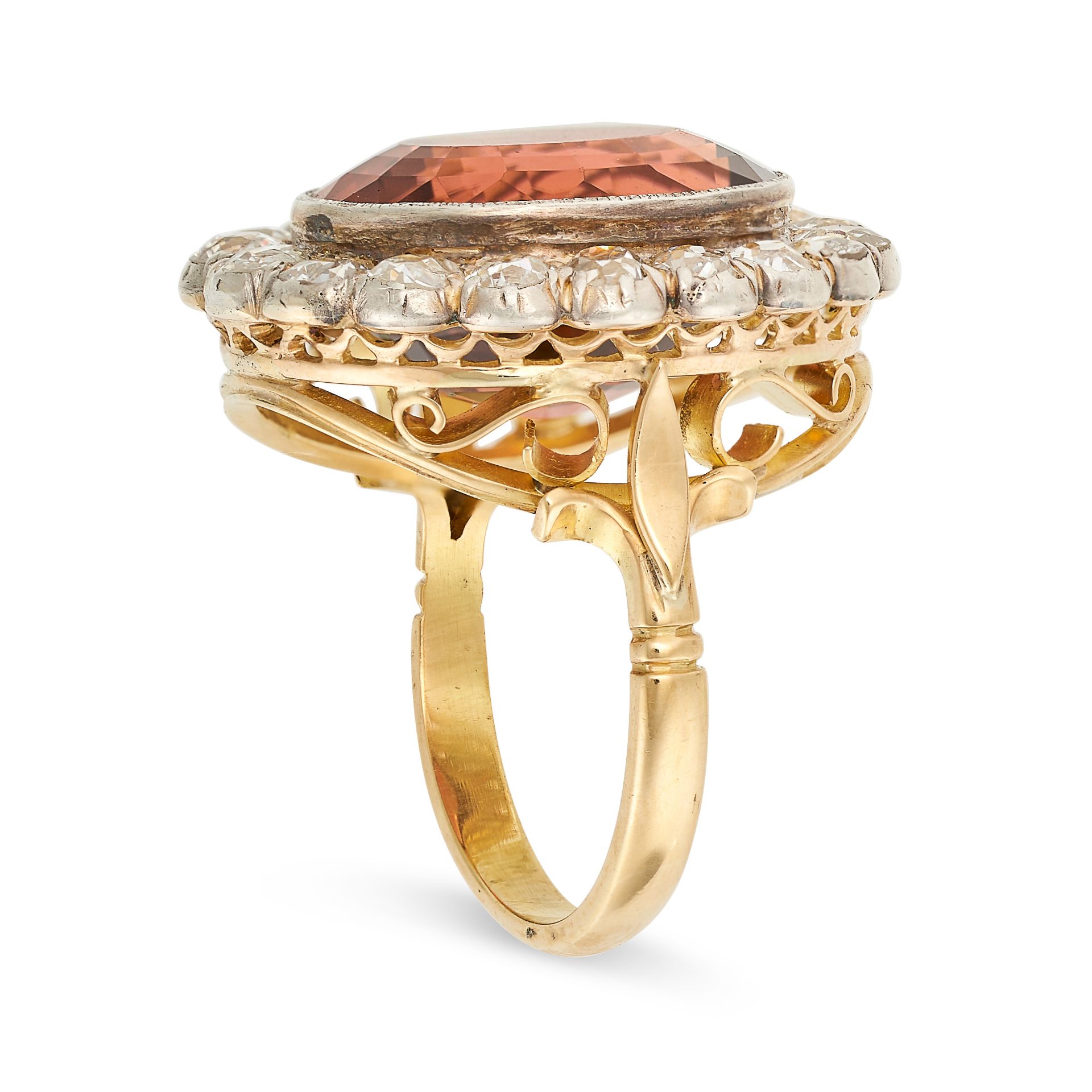 A PINK TOURMALINE AND DIAMOND DRESS RING in yellow gold and silver, set with an oval cut pink - Image 2 of 2