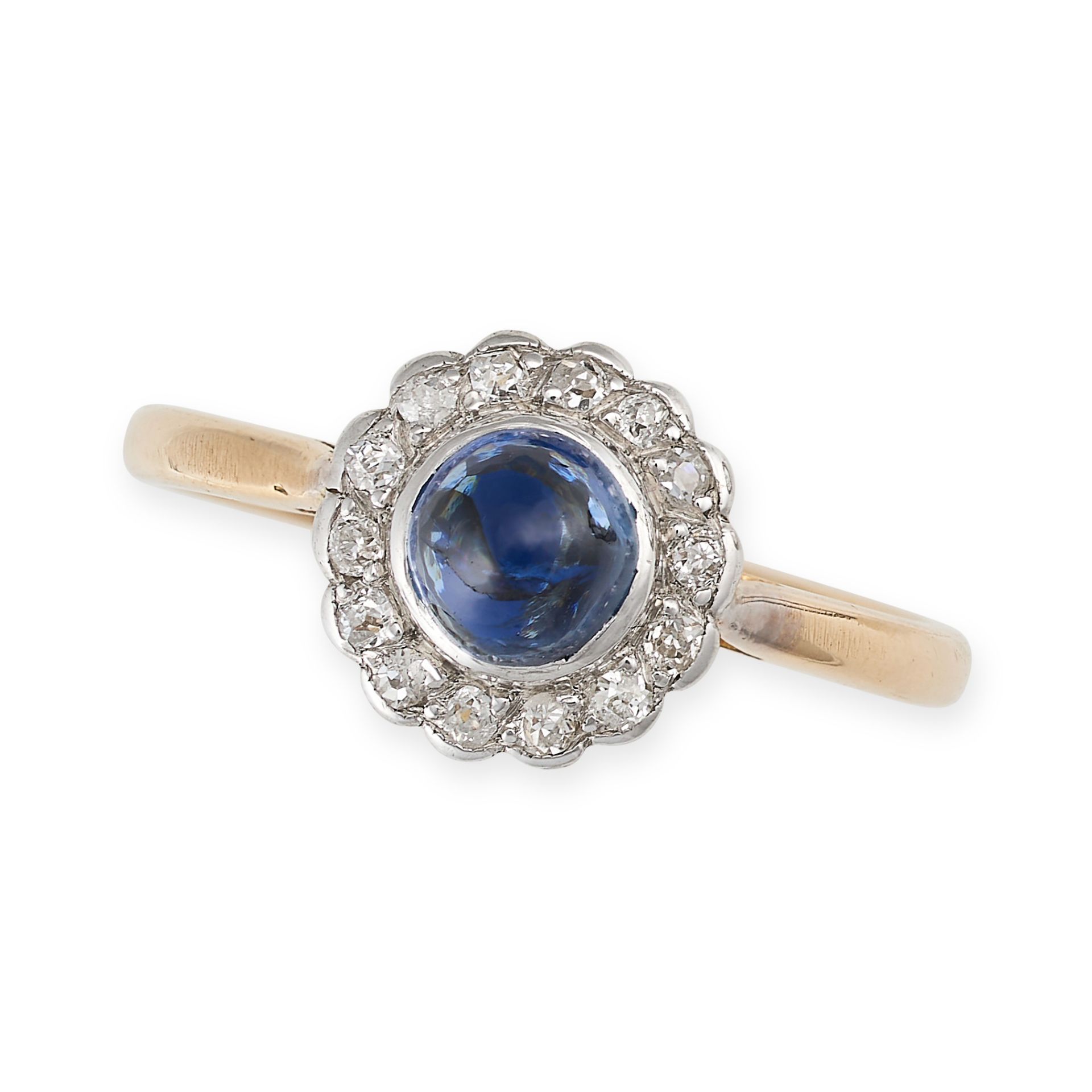 A SAPPHIRE AND DIAMOND CLUSTER DRESS RING in 18ct yellow gold and platinum, set with a round