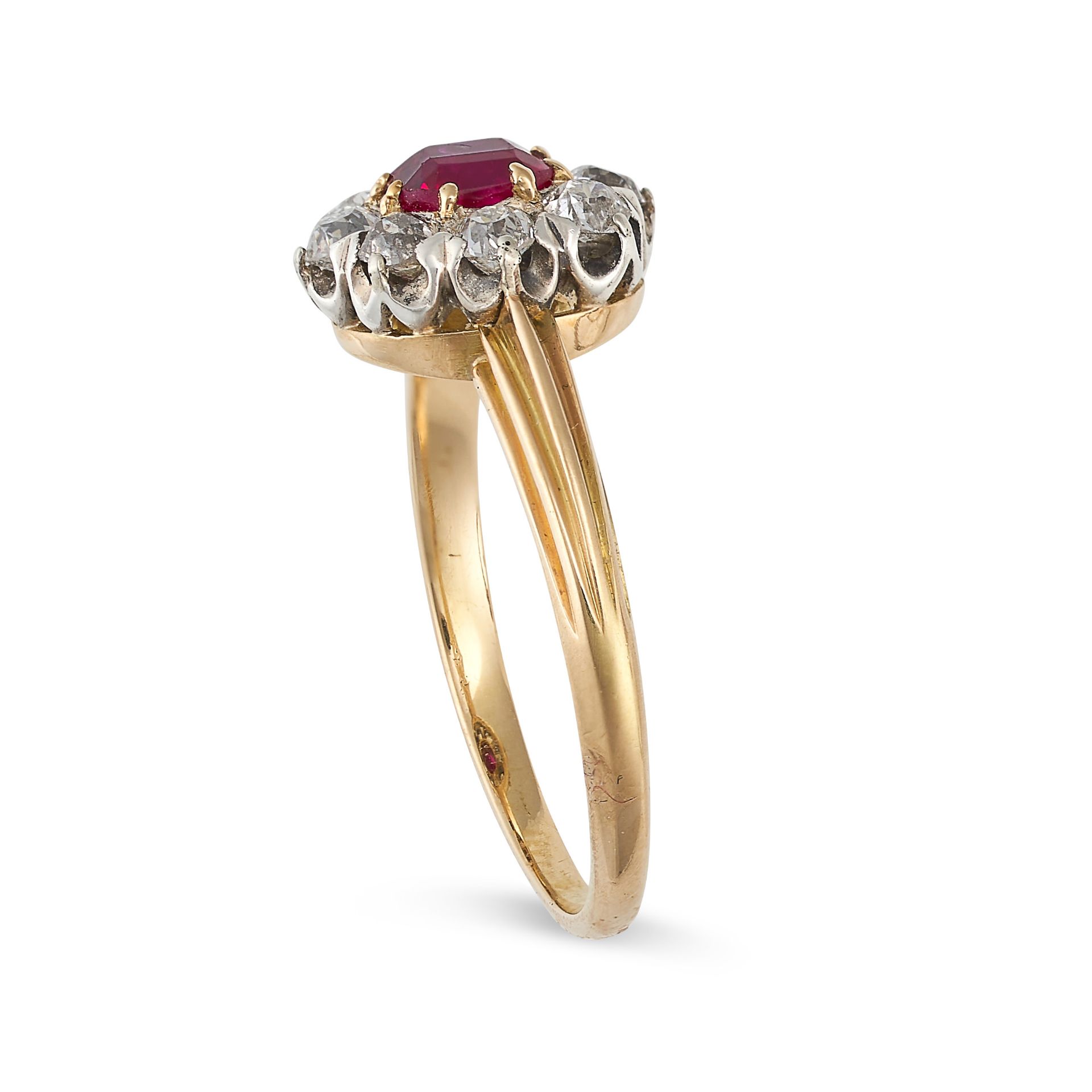 A RUBY AND DIAMOND CLUSTER RING in yellow gold and platinum, set with a step cut ruby of 0.66 carats - Image 2 of 2