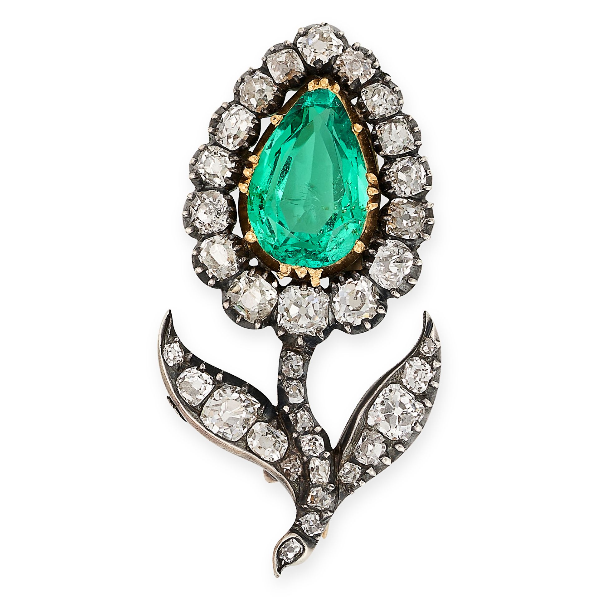 A FINE ANTIQUE COLOMBIAN EMERALD AND DIAMOND BROOCH in yellow gold and silver, designed as a flower,