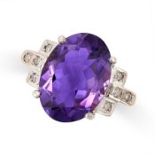 AN AMETHYST AND DIAMOND DRESS RING in yellow gold and white gold, set with an oval cut amethyst