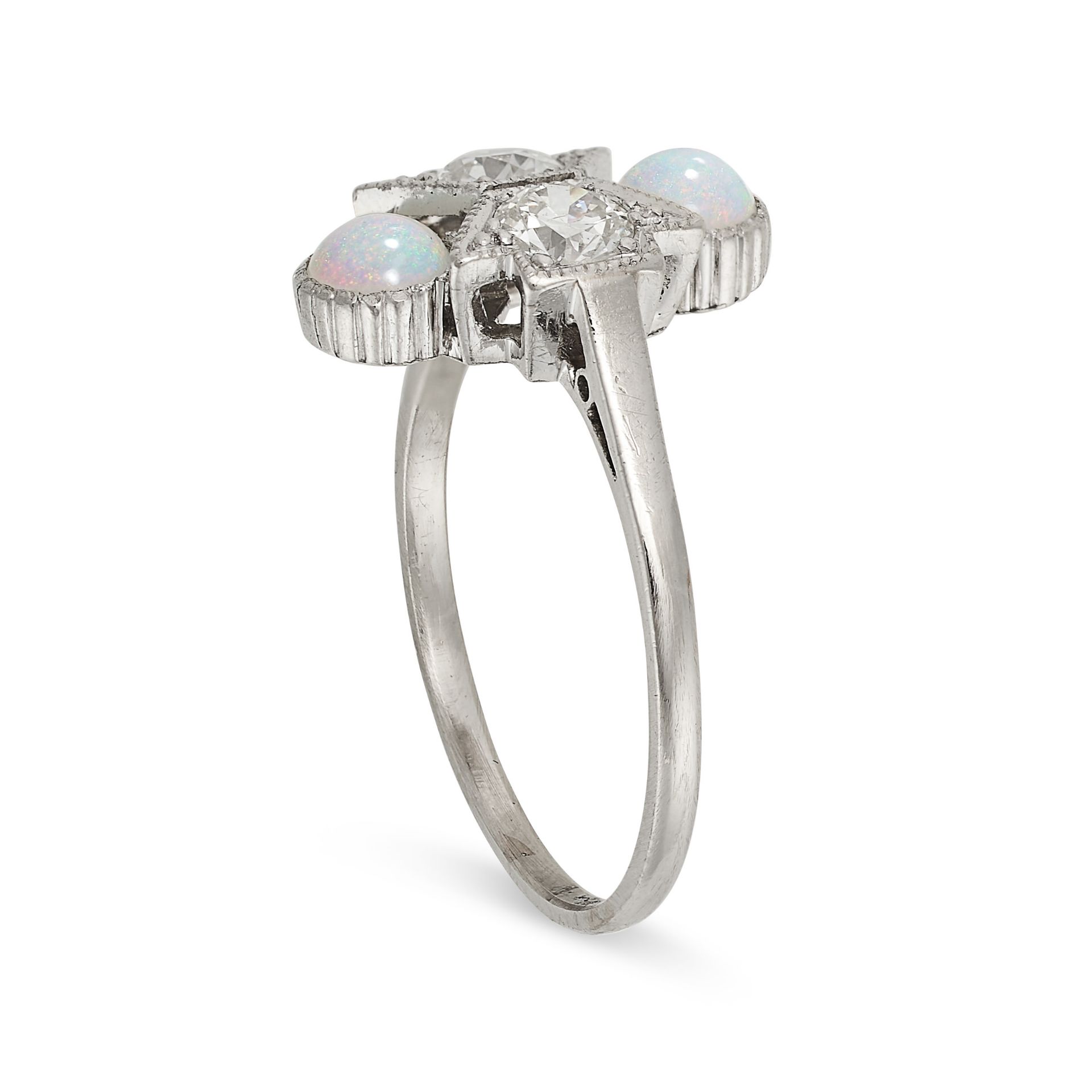 AN OPAL AND DIAMOND DRESS RING in platinum, set with two cabochon opals and two old cut diamonds, - Bild 2 aus 2