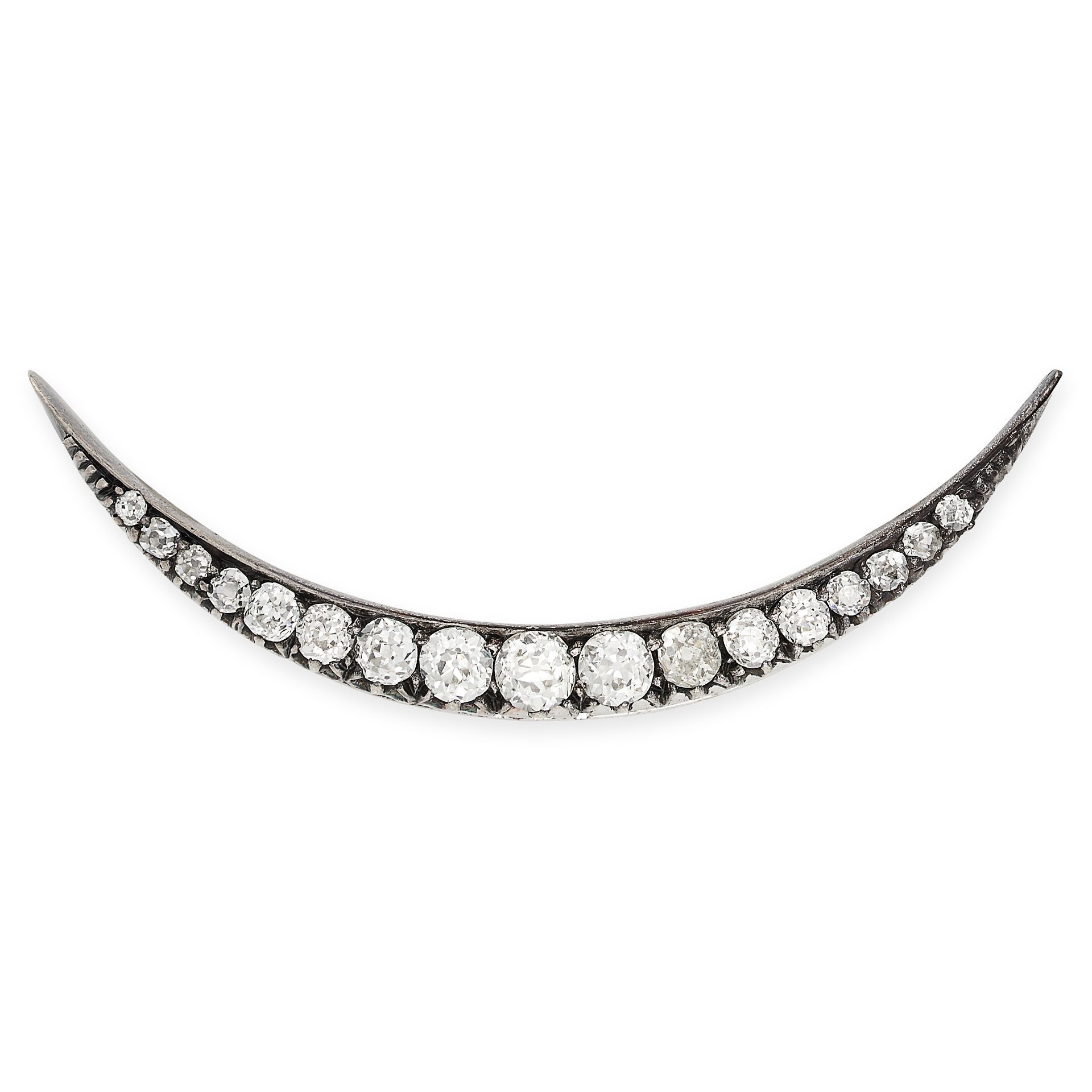 AN ANTIQUE VICTORIAN DIAMOND CRESCENT MOON BROOCH in gold and silver, set with a row of graduated