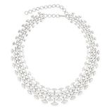 A DIAMOND COLLAR NECKLACE in 18ct white gold, set with five rows of graduated marquise cut