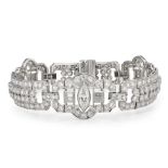 AN ART DECO DIAMOND BRACELET, 1930s in platinum, comprising three stylised sections set with