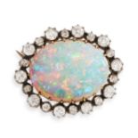 AN ANTIQUE OPAL AND DIAMOND BROOCH in yellow gold and silver, set with a cabochon opal in a border